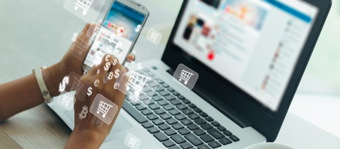 Businesswoman,Phone,And,Laptop,Using,,,Online,Shopping,Concept.